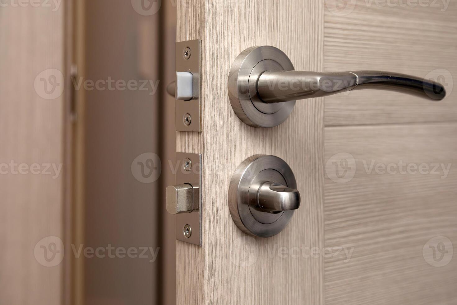 Installing a new door handle, closeup shot. photo