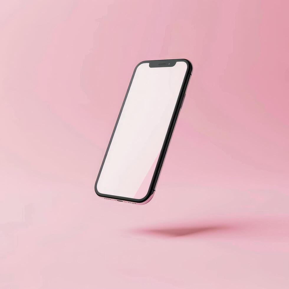 Cell Phone With White Screen on Pink Background photo