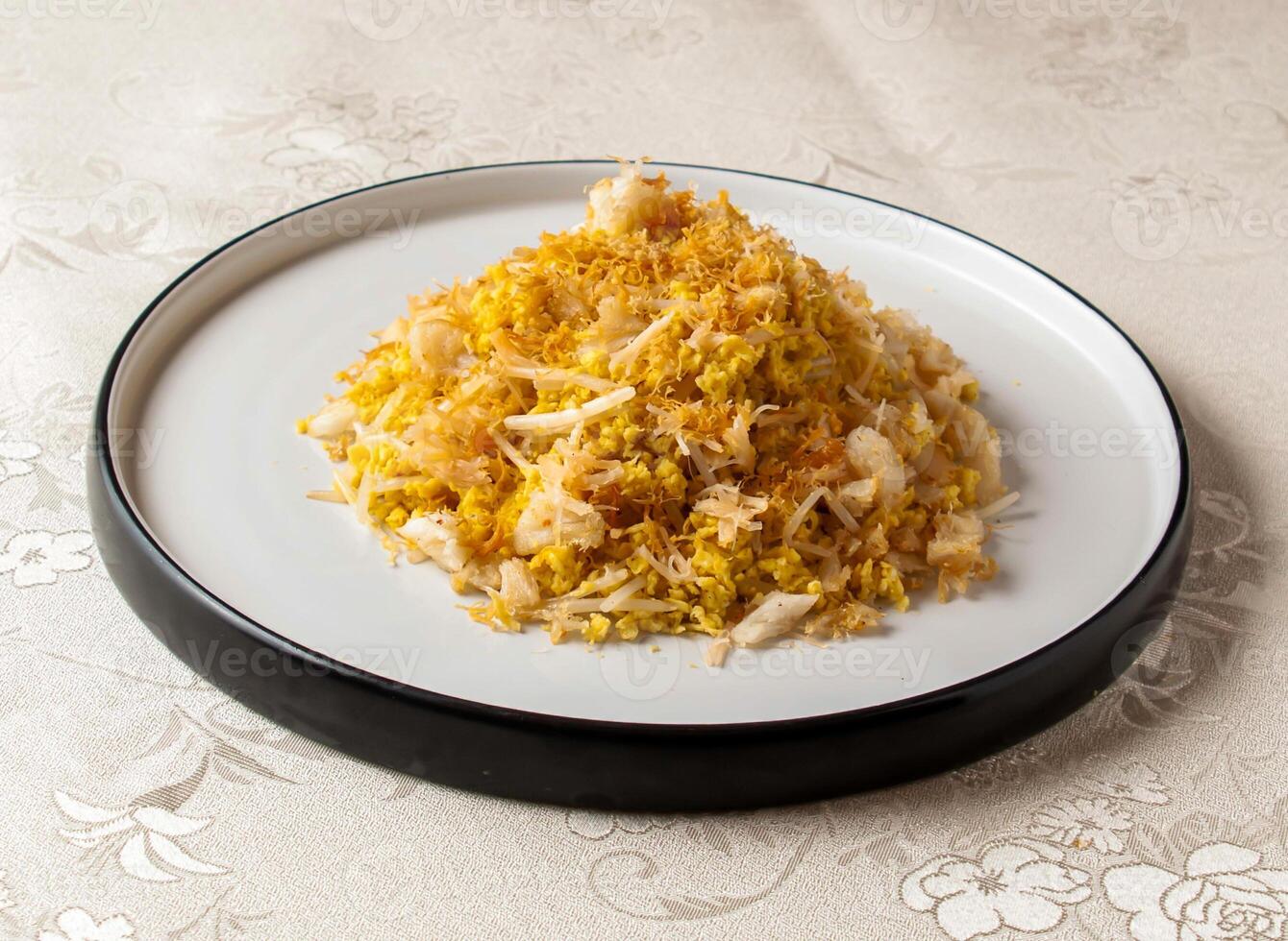 Jinyao Jade Belt Race Crab served dish isolated on background top view of hong kong chinese food photo