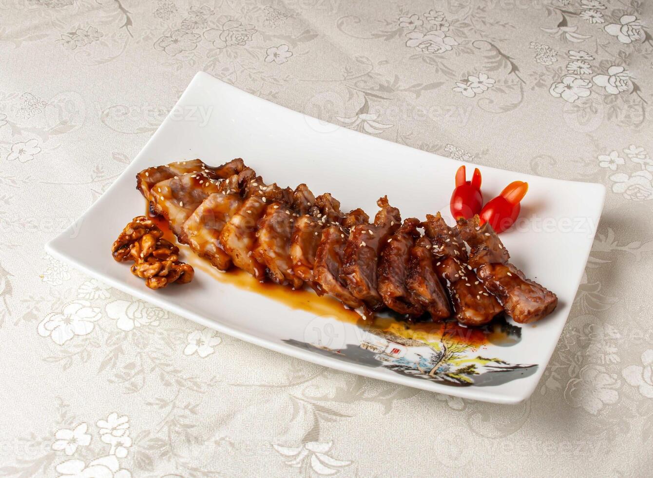 Three after taste honey beef served dish isolated on background top view of hong kong chinese food photo
