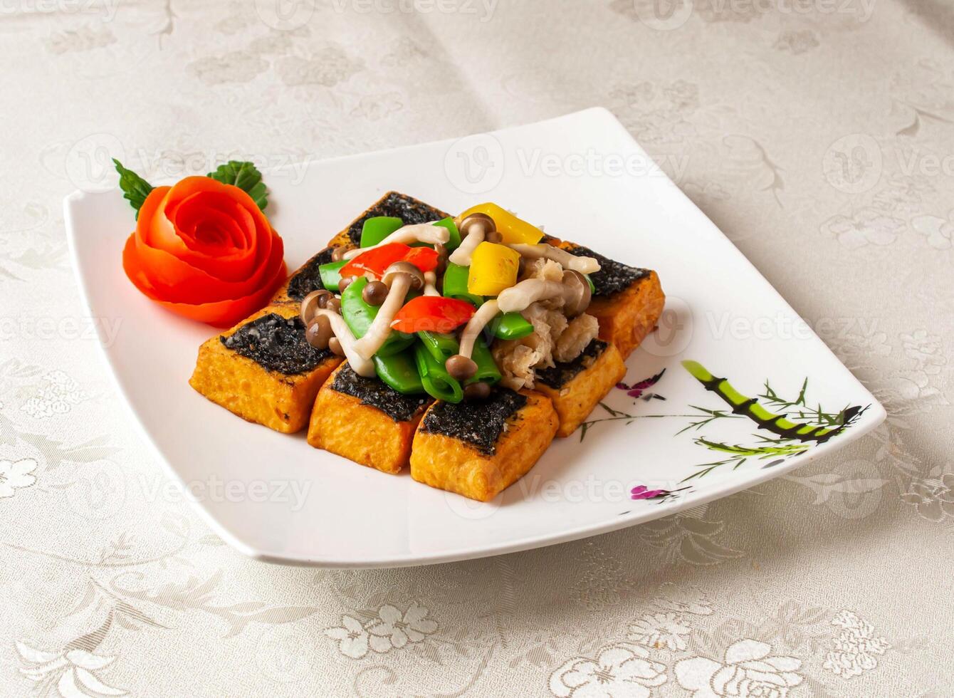 Bamboo Nori Tofu served dish isolated on background top view of hong kong chinese food photo