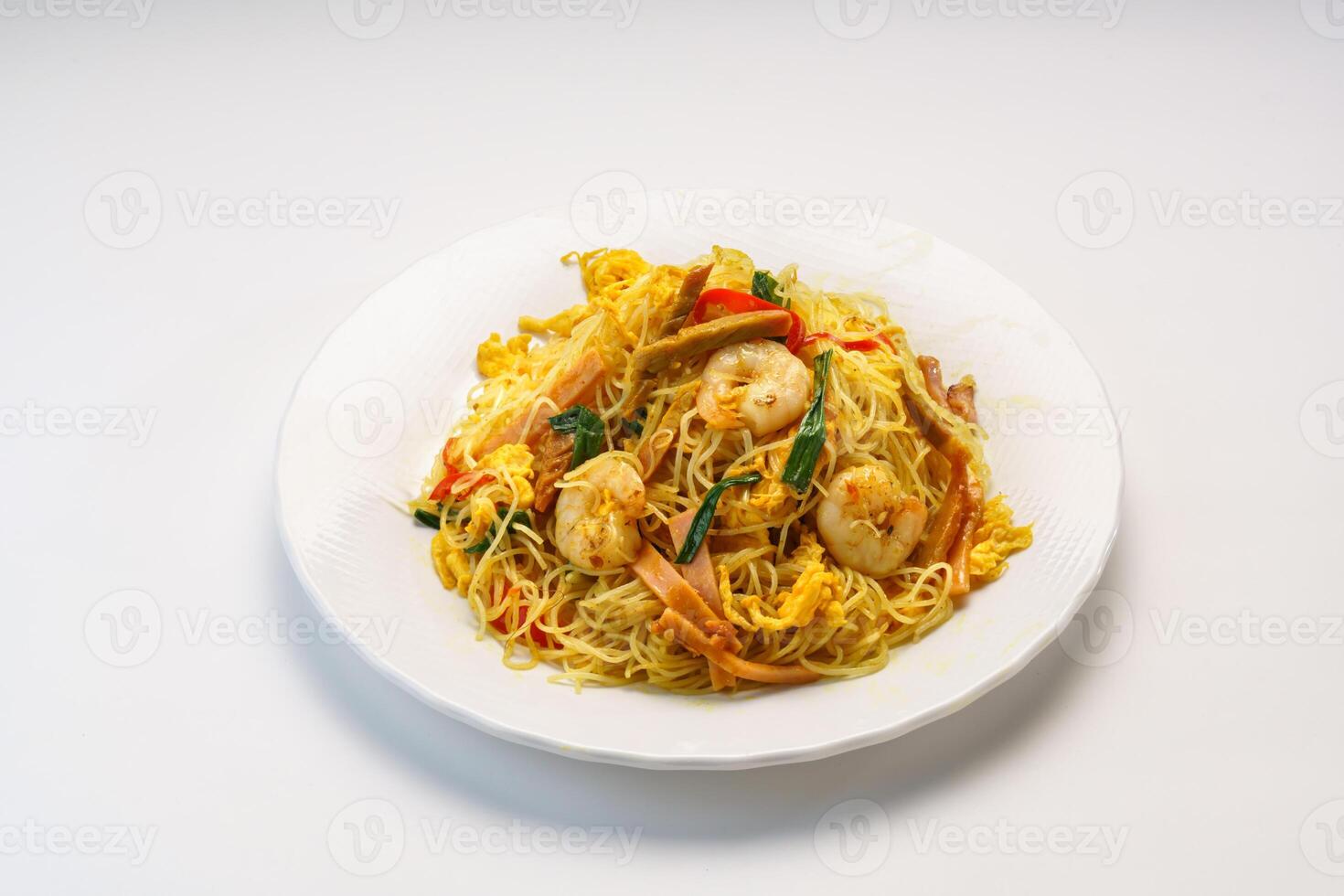 Xingzhou Fried Rice or shrimp fried noodles served in plate isolated on wooden table side view of hong kong fast food photo