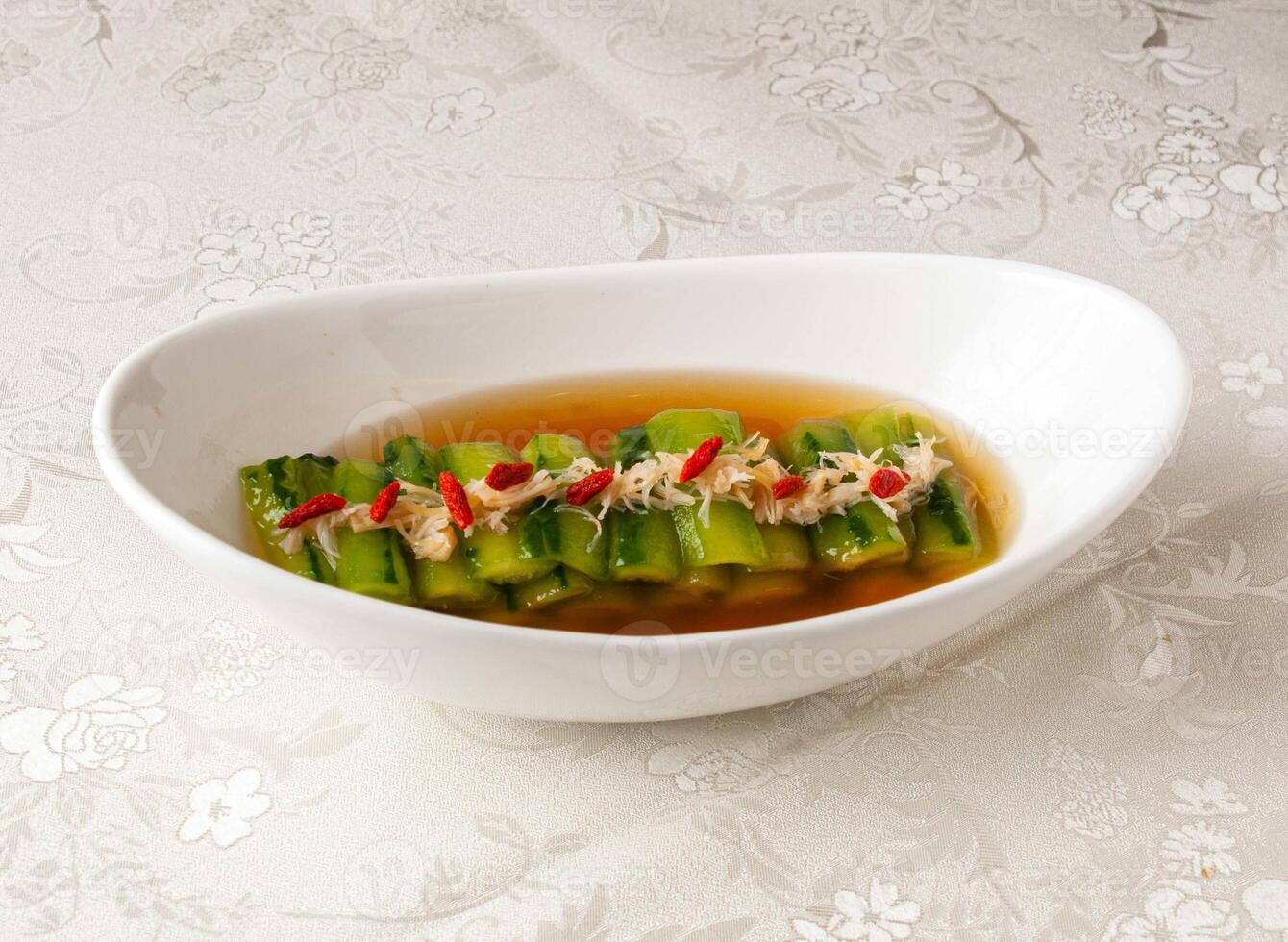 Emerald white jade sauce served dish isolated on background top view of hong kong chinese food photo