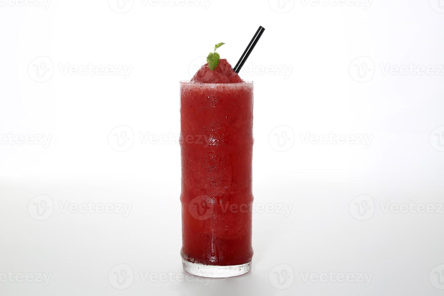 Strawberry fresh juice with straw served in glass isolated on grey background side view of healthy morning arabic drink photo
