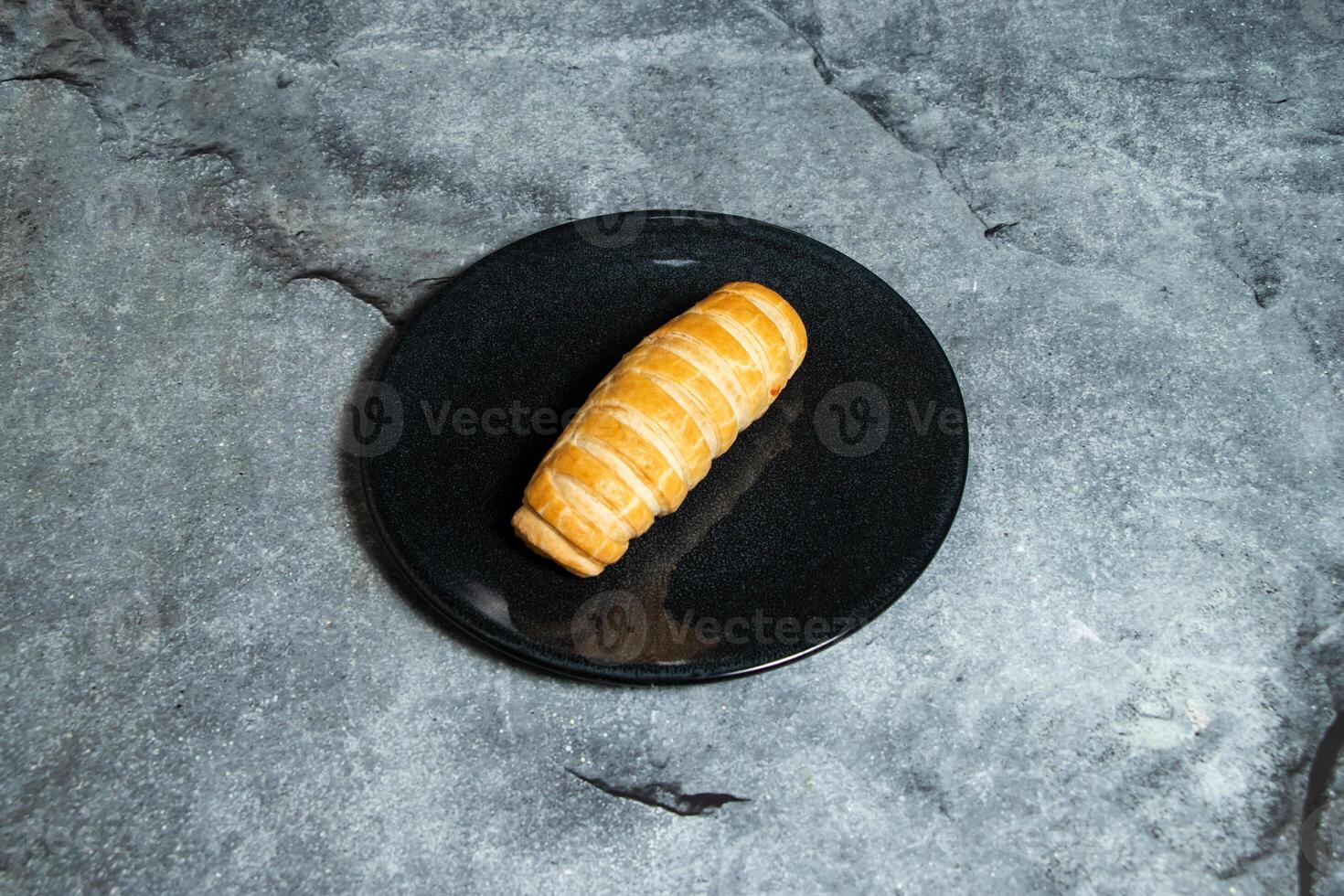 Spicy Beef Puff Pastry served in plate isolated on background top view of baked food indian dessert photo