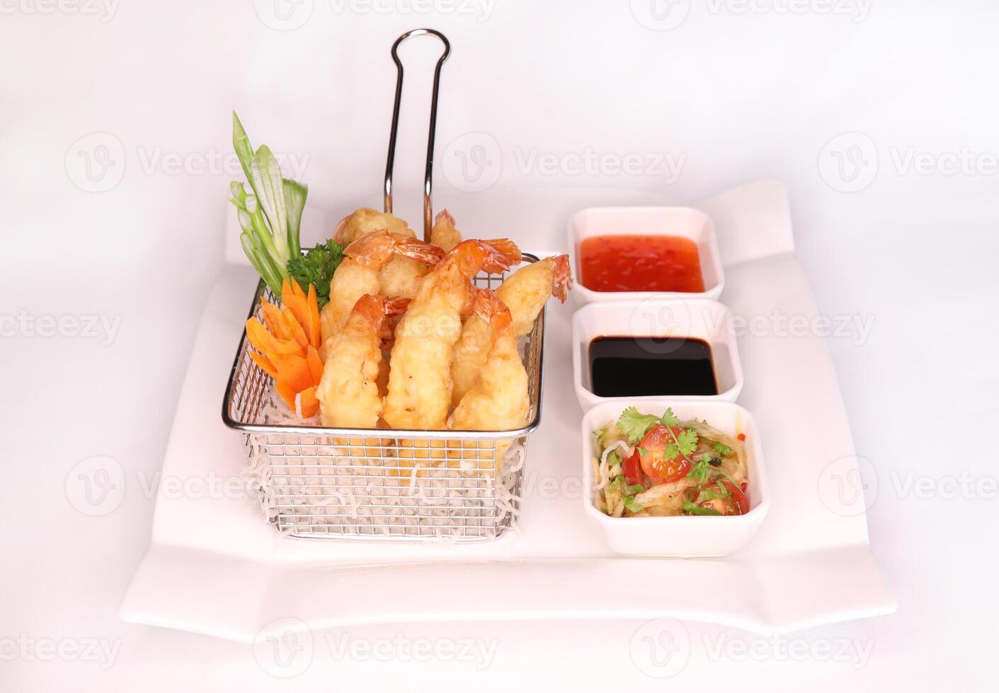 PRAWN TEMPURA with salad, tomato, carrot, dip and sauce served in dish isolated on background side view of arab food photo