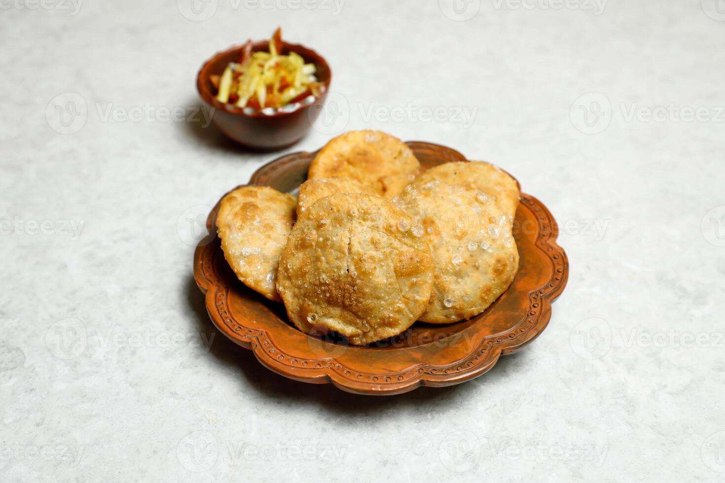 served in dish isolated on table top view of indian, bangladeshi and pakistani street food photo