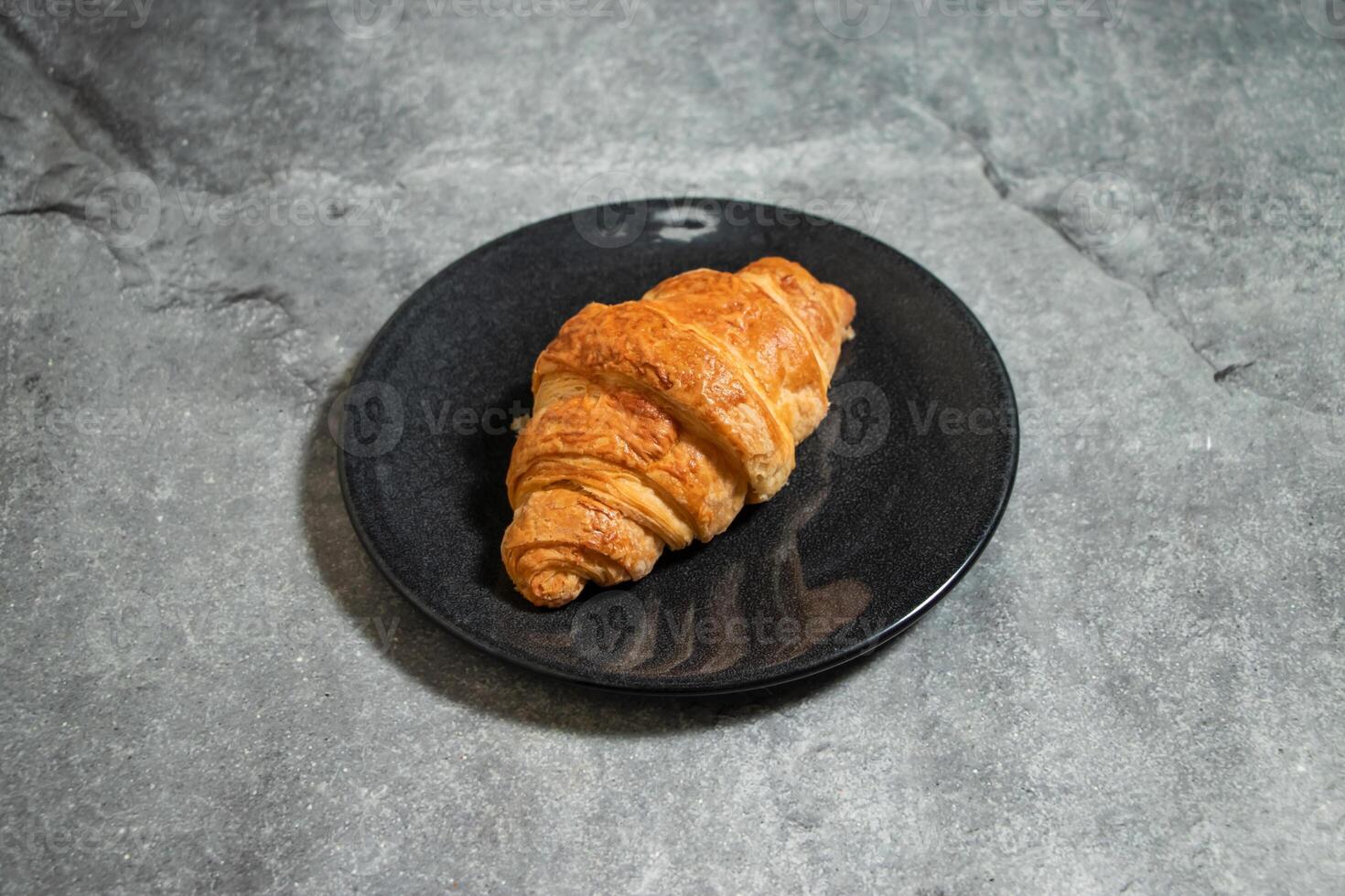 Cheese Croissant puff pastry served in plate isolated on background top view of baked food indian dessert photo