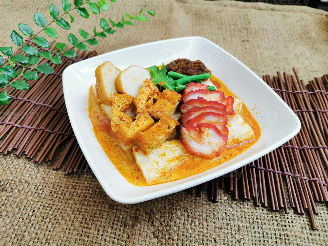 Char Siew Rice Noodle Roll served dish isolated on table top view of thai food photo