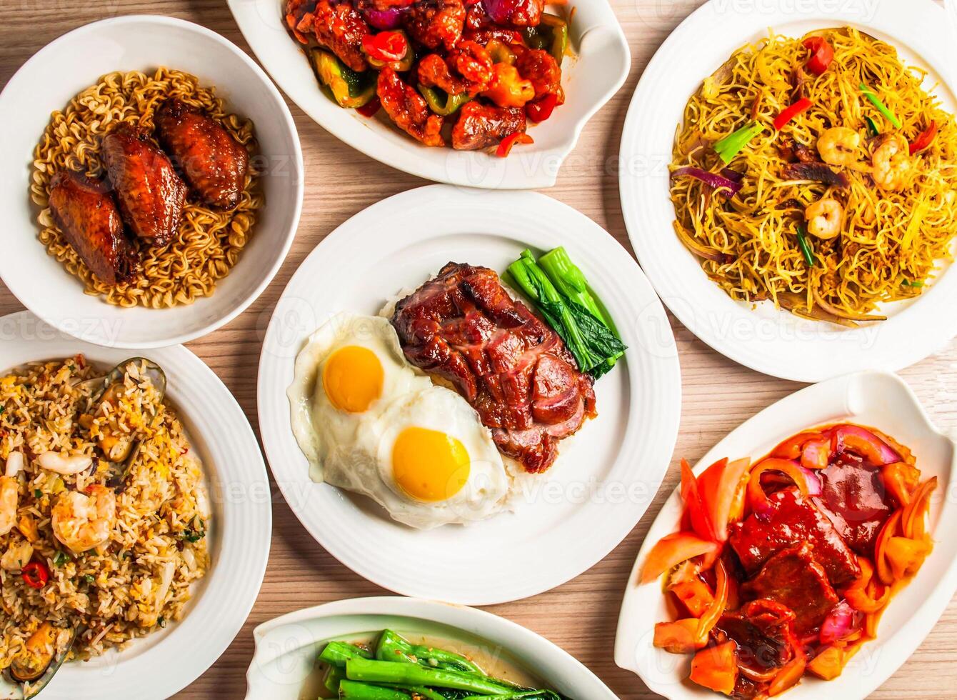roasted pork with fried sunny egg and rice, chicken wings noodles set, fried ribs with pineapple, sweet and sour ribs, singapore style fried rice noodles, seafood fried rice with xo sauce and kai lan photo