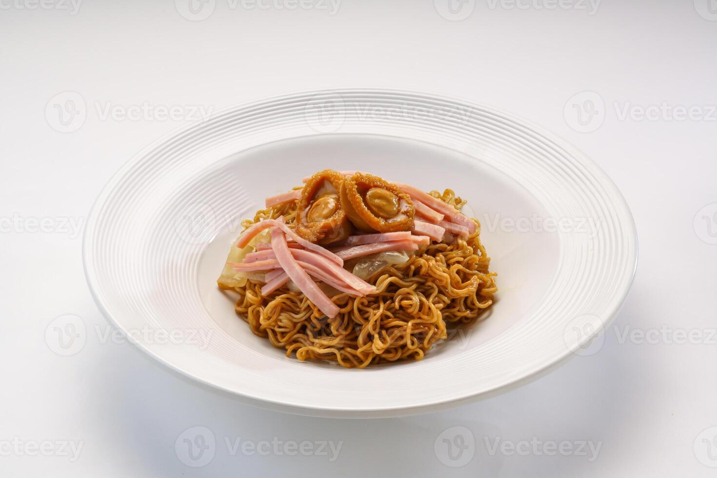 Real Abalone and Shredded Ham instant noodles served in plate isolated on wooden table side view of hong kong fast food photo