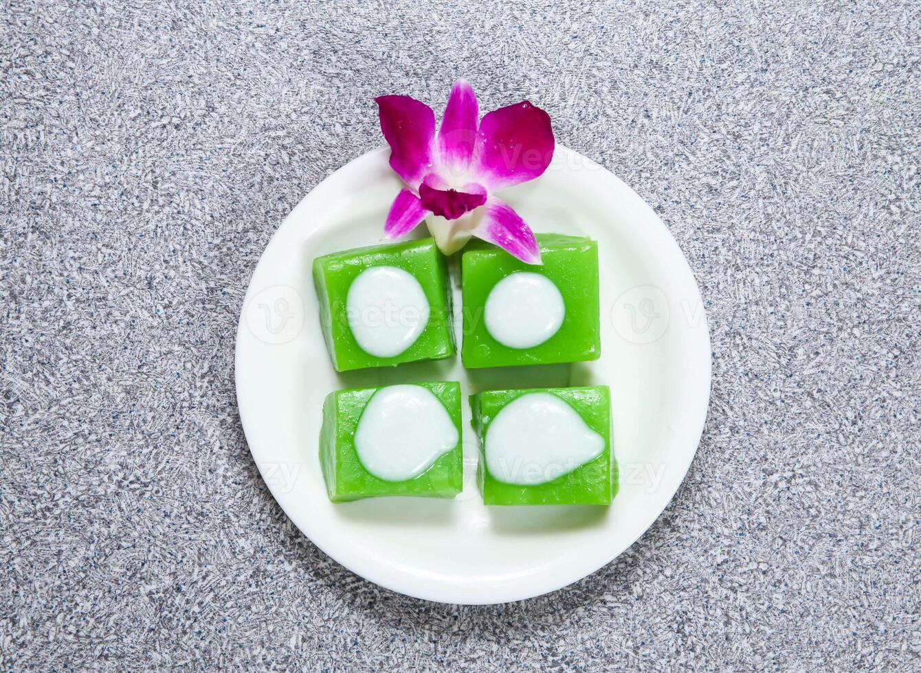 Japanese warm layer cake served in dish isolated on grey background top view of hong kong food photo