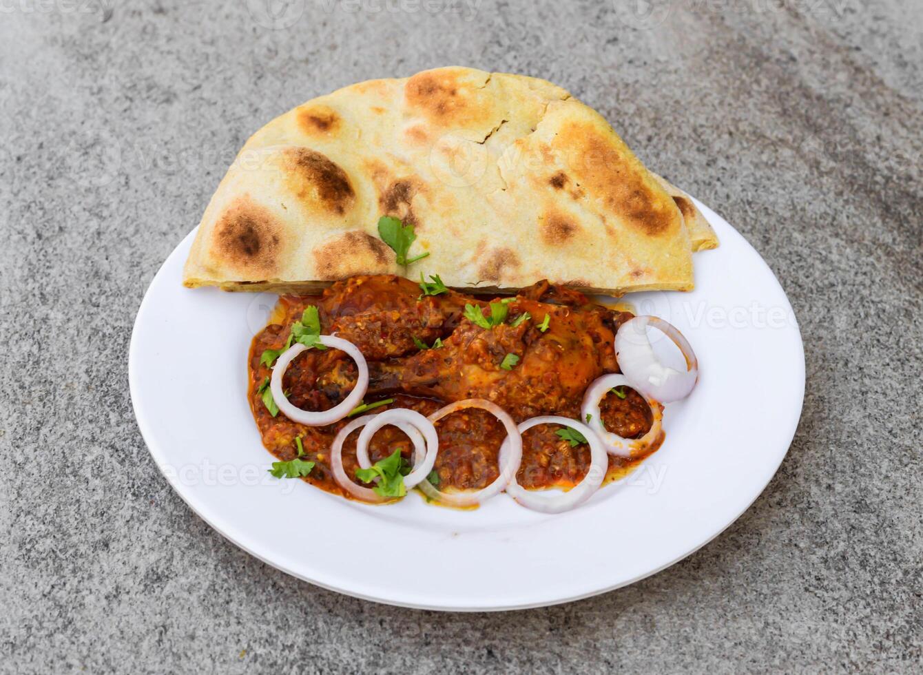 bbq tandoori chicken with naan, roti served in dish isolated on background top view of indian spices and pakistani food photo