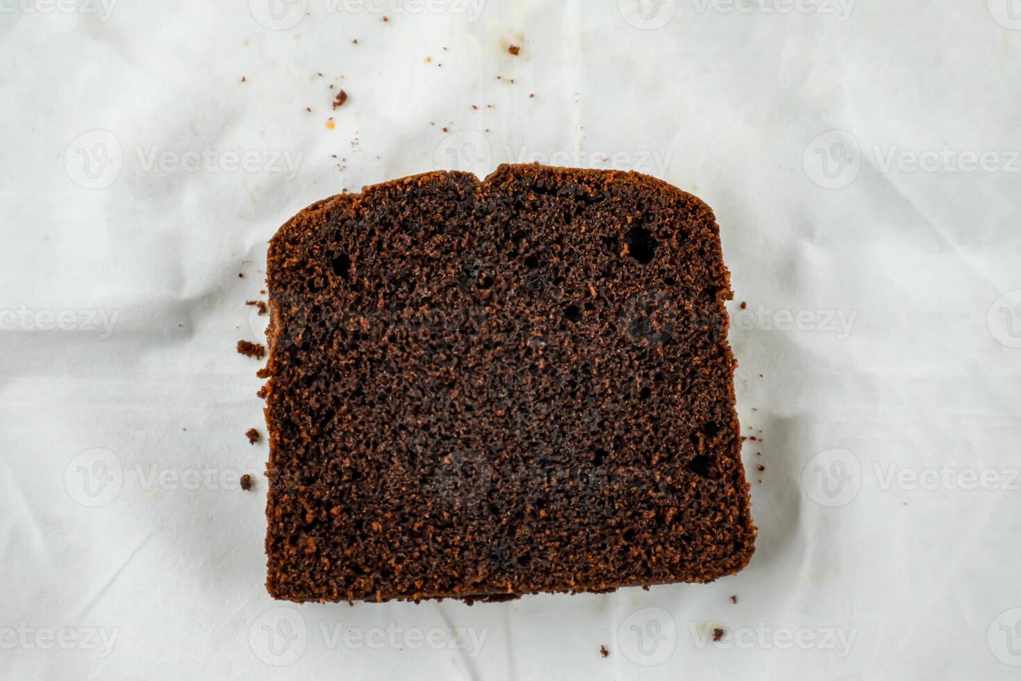 Chocolate Cake slice isolated on grey background top view of french breakfast baked food item on grey background photo