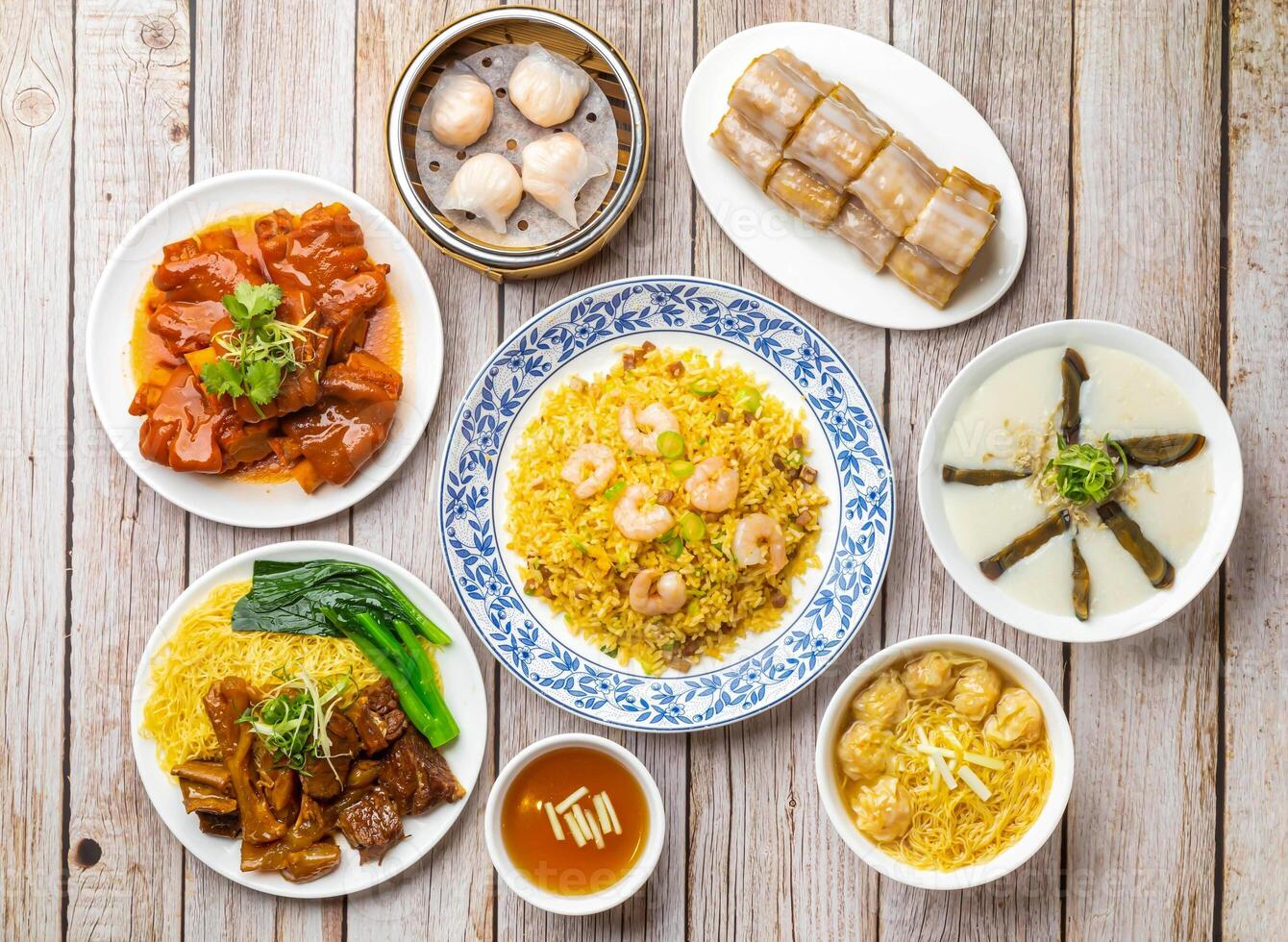 salted lean pork and preserved egg congee, rice noodle rolls filled with twisted cruller, shrimp fried rice, steam shrimp dumplings, pig feet beancurd, wonton noodles soup isolated hong kong food photo