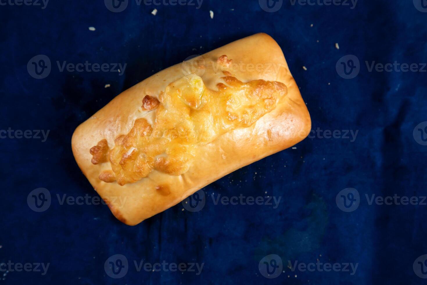 Beef Roll isolated on blue background top view of savory snack food photo