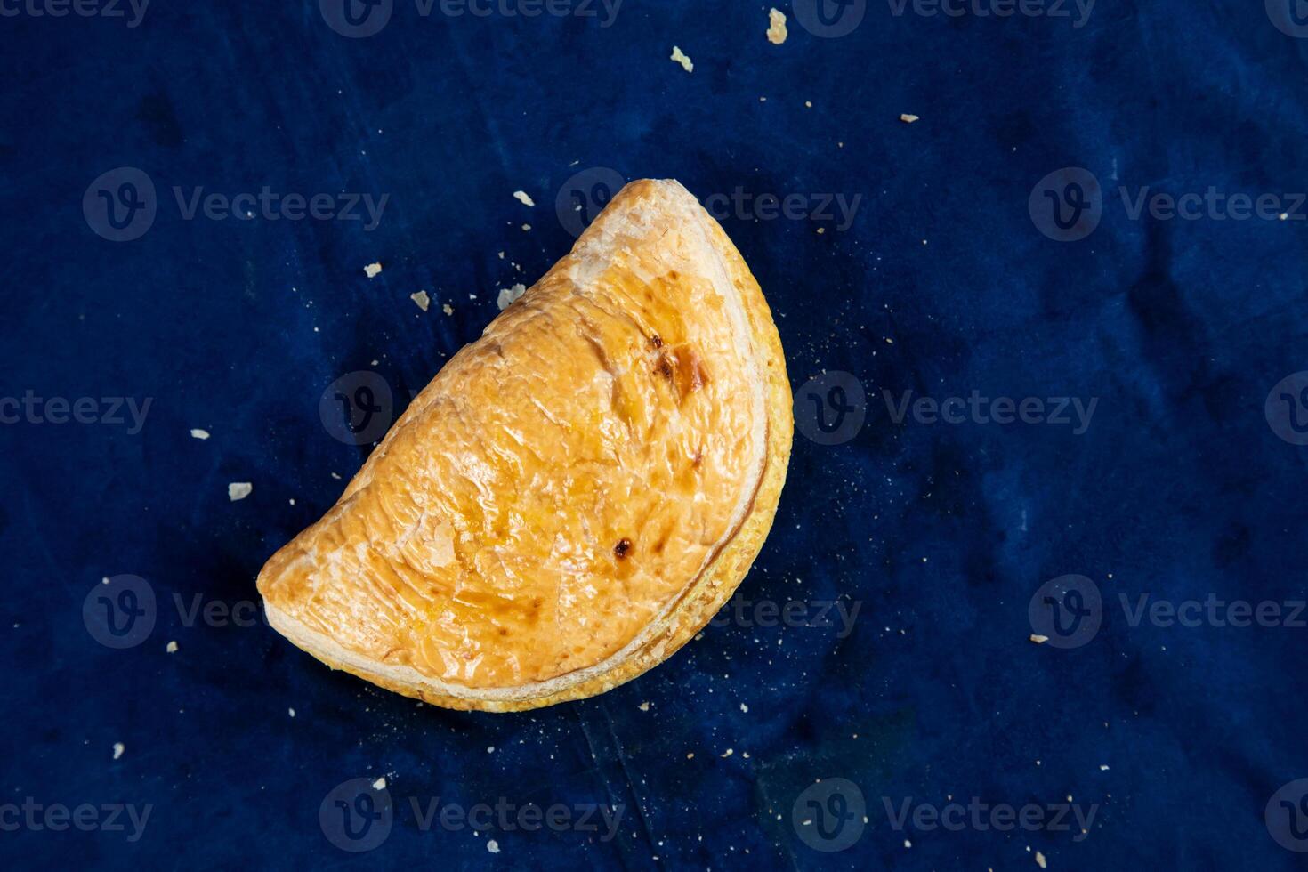 Beef Patties isolated on blue background top view of savory snack food photo