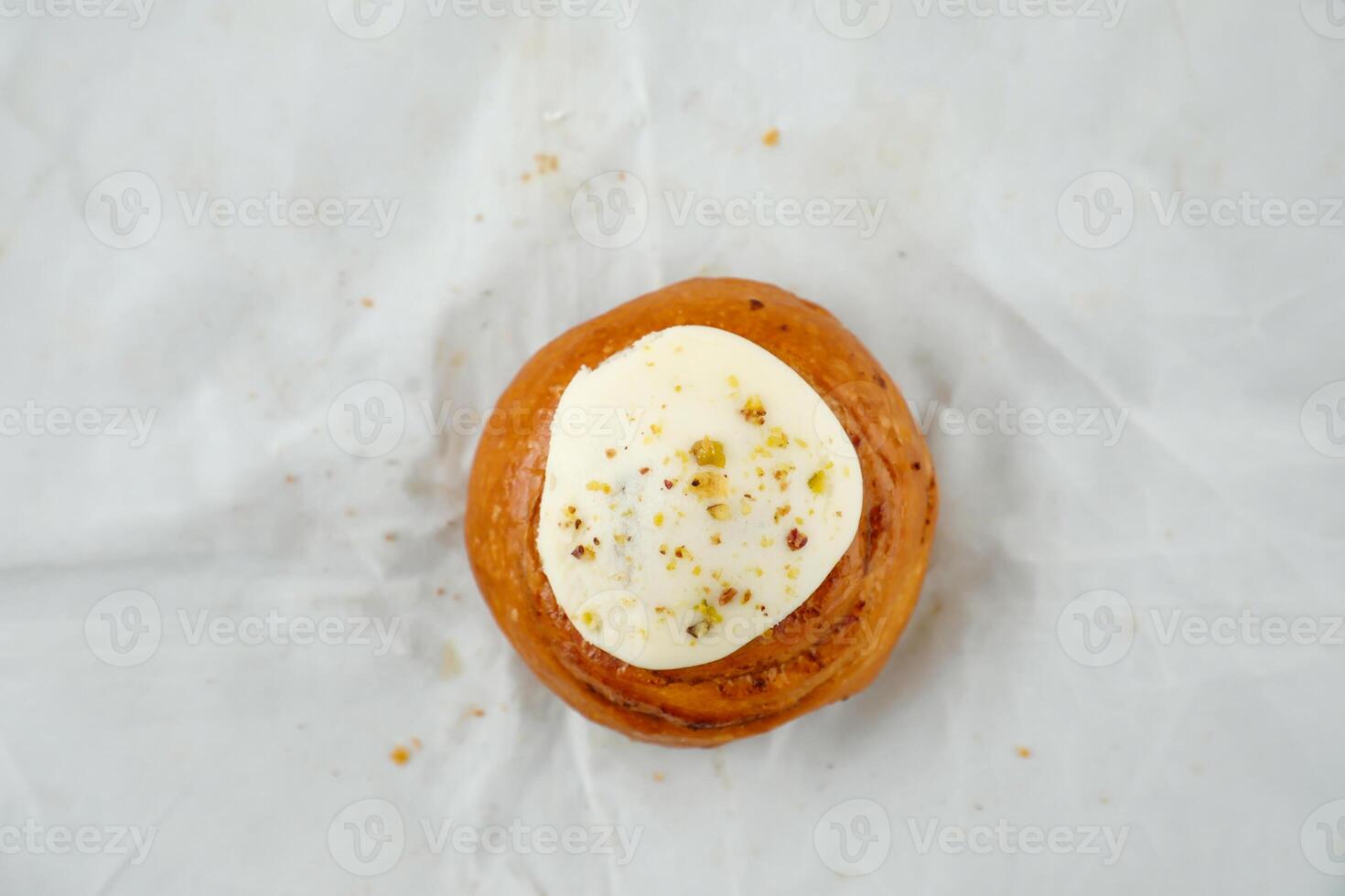 Cinnamon Roll isolated on grey background top view of french breakfast baked food item photo