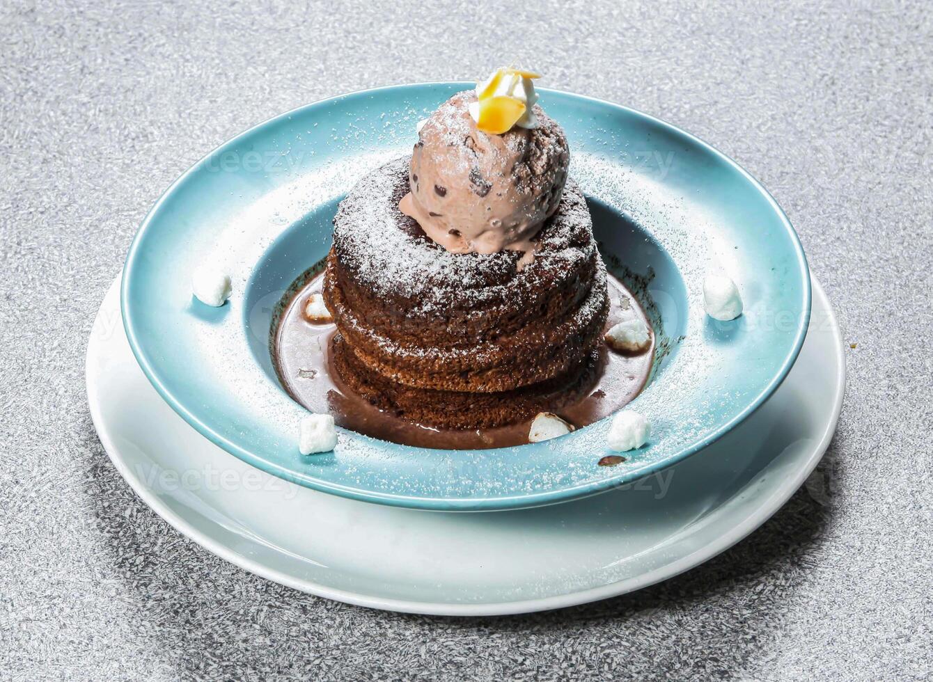 Espresso Chocolate Snow Mountain Hot Cake served in dish isolated on background top view of hong kong dessert food photo