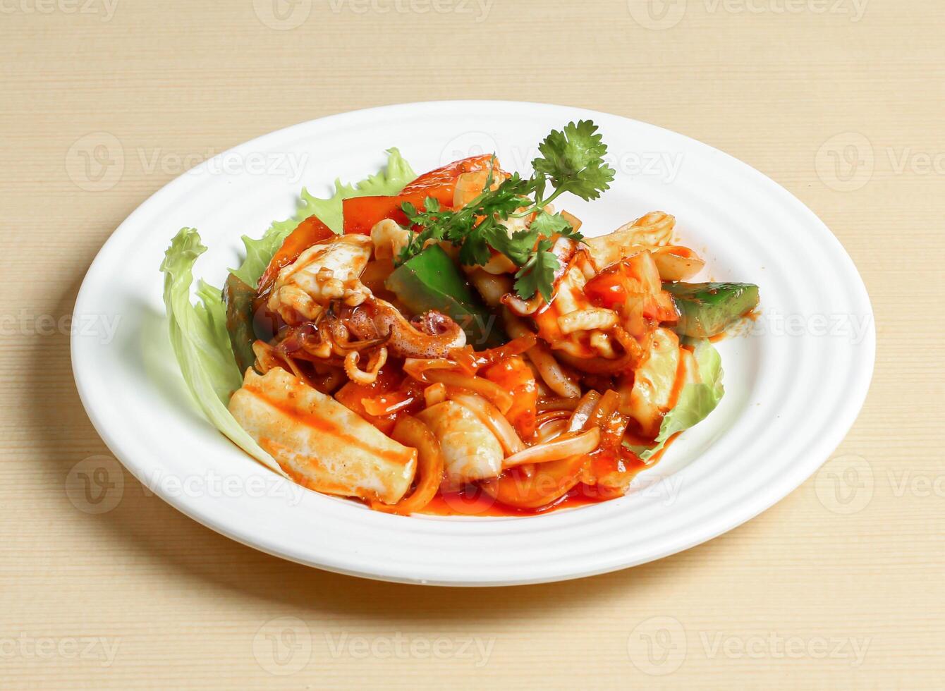 sambal squid served in dish isolated on background top view singapore food photo