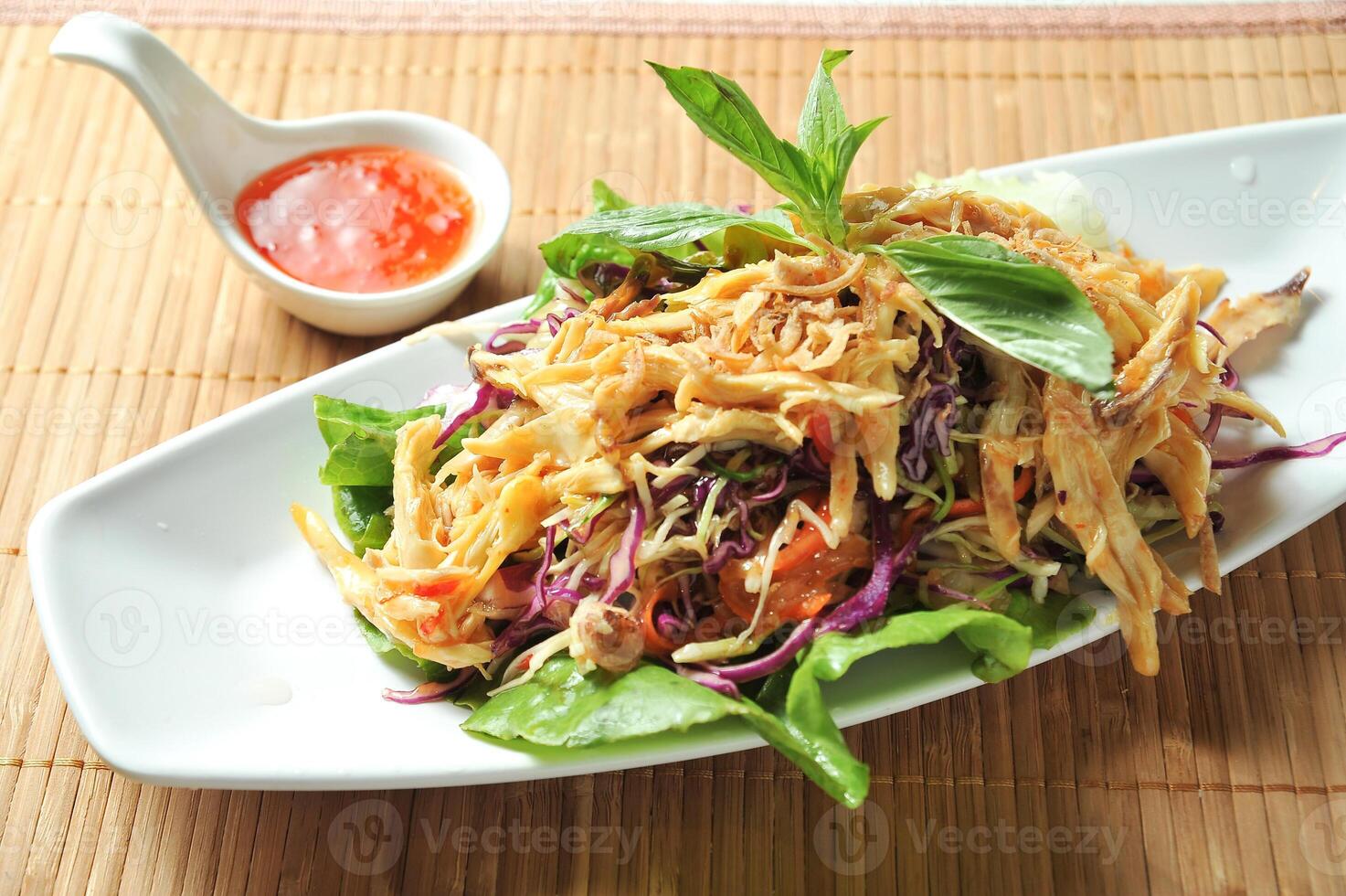 Annam Broccoli Shredded Chicken Salad with chilli sauce served in dish isolated on table green food photo