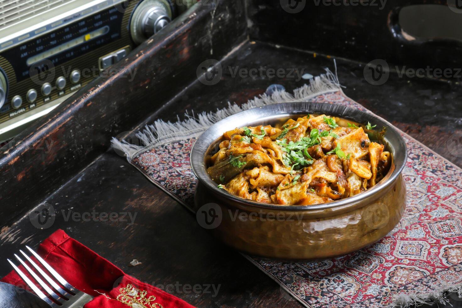 Chicken Margouga, Meat Ragout, marquqah lahm, served in dish isolated on red mat top view on table arabic food photo