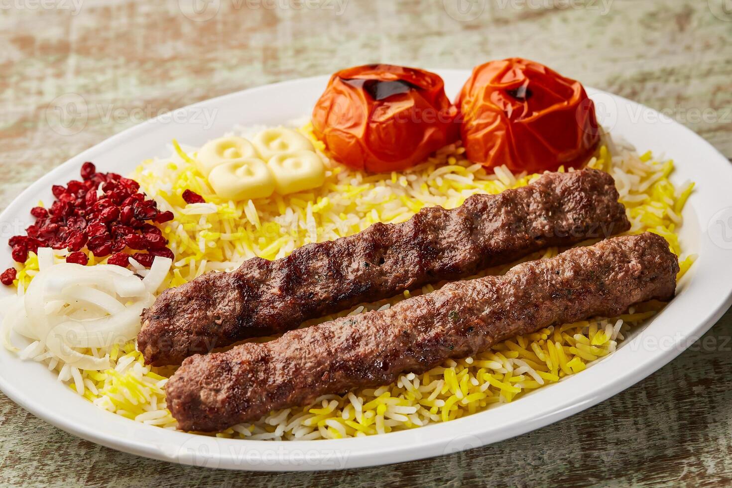 chelo kebab, chalo kabab or cheelo with mandi biryani rice served in dish isolated on table top view of arabic food photo