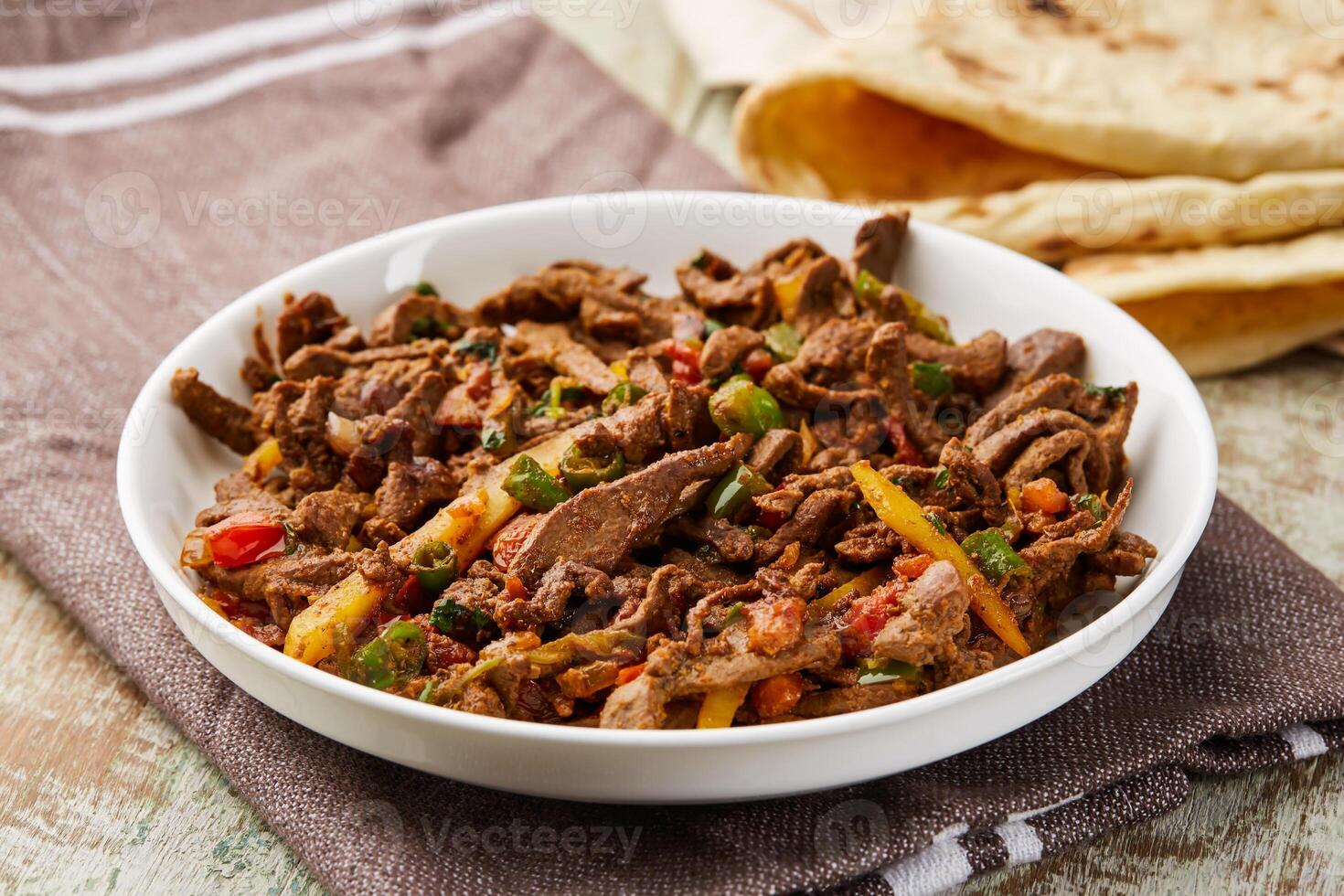 Beef Liver masala kaleji served in dish isolated on table top view of arabic food photo