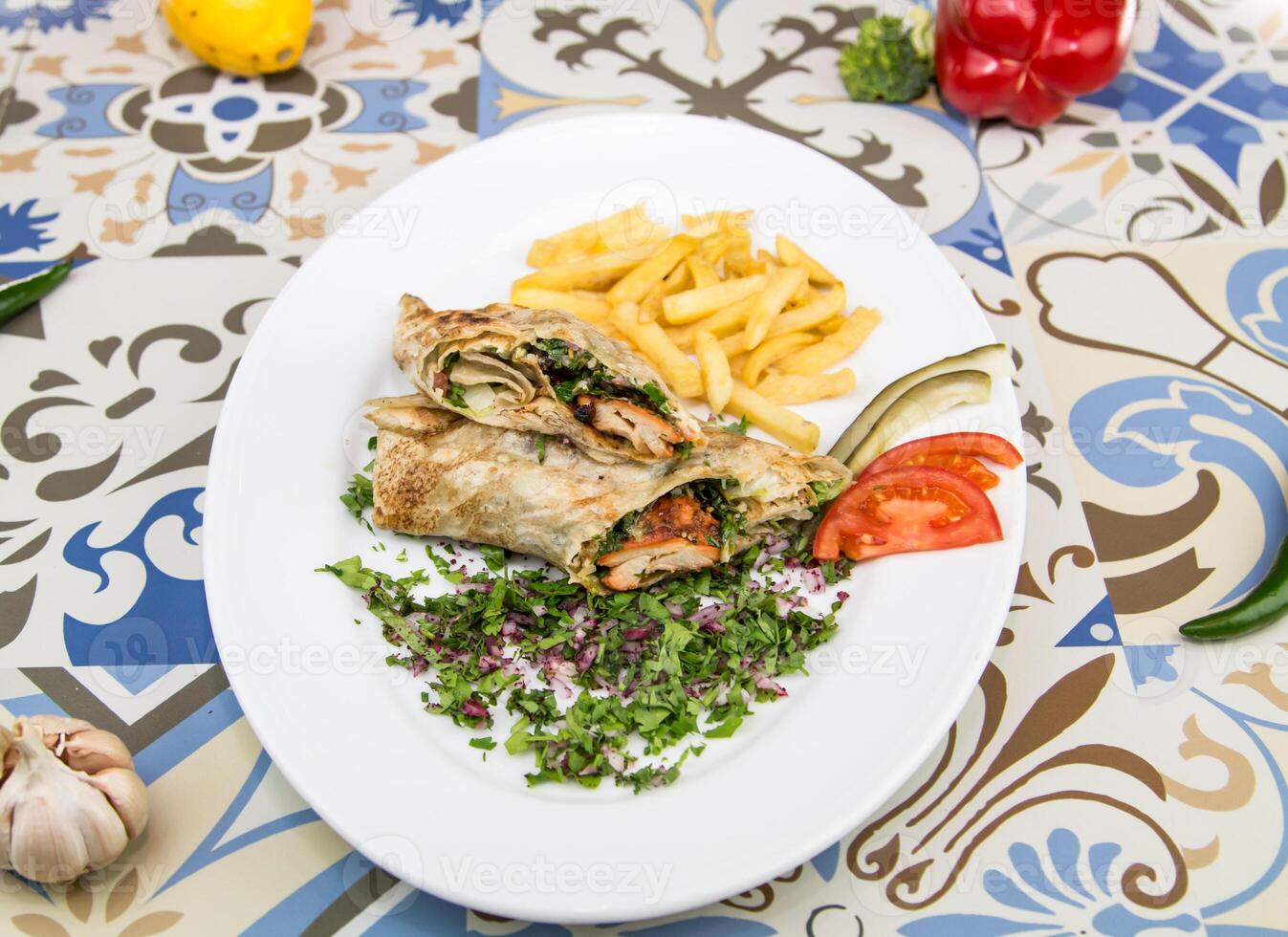 Shish Tawook Sandwich shawarma wraps with fries served in dish isolated on table top view of arabic food photo