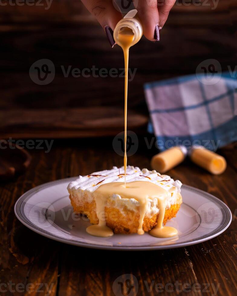 Milkcake served in dish isolated on wooden table side view of arabic cafe food photo