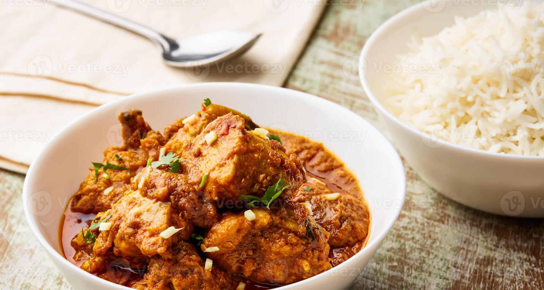Beef Meat CurryKorma Masala Karahi with boiled rice served in dish isolated on table top view of arabic food photo