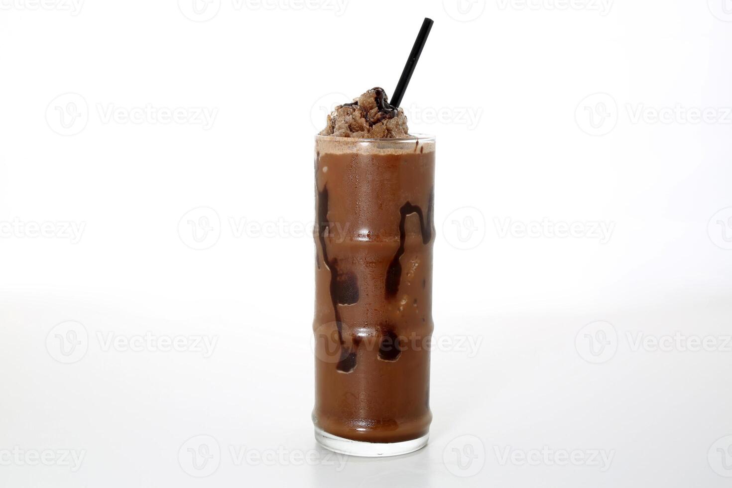 Chocolate milkshake with straw served in glass isolated on grey background side view of healthy morning arabic drink photo