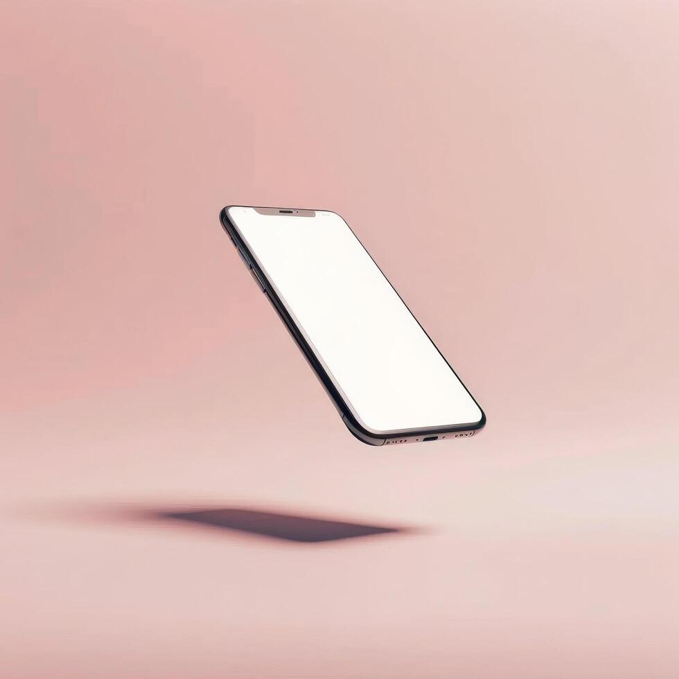 Cell Phone With White Screen on Pink Background photo