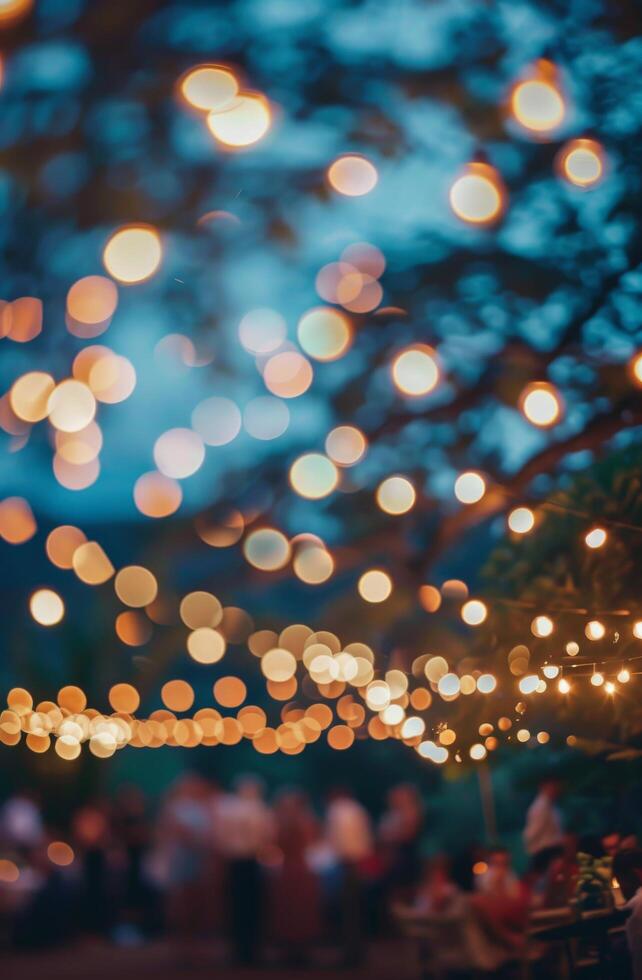 Group of People Sitting at Table Under Lights photo