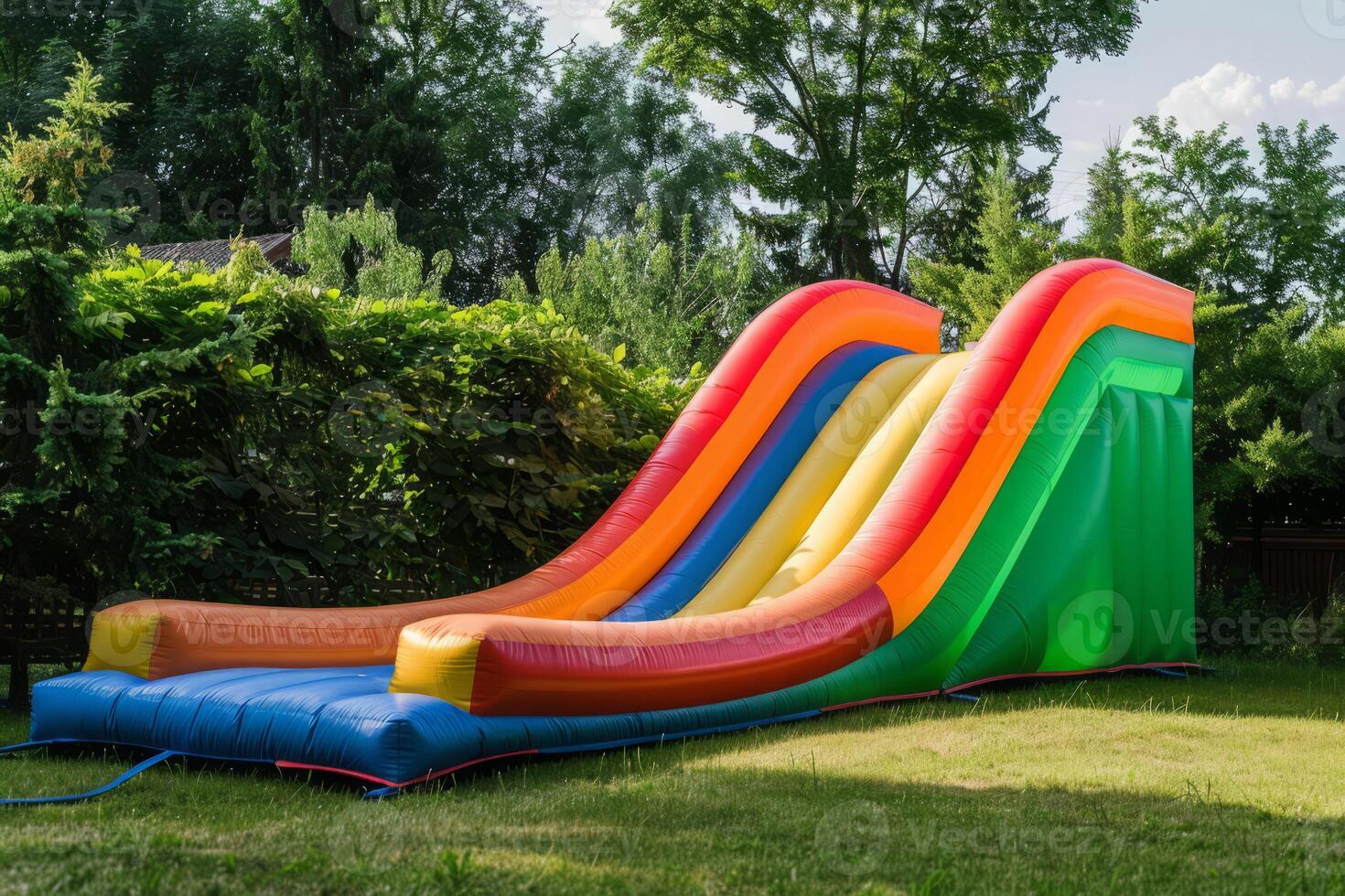 AI generated Colorful bounce slide for children entertainment in backyard photo