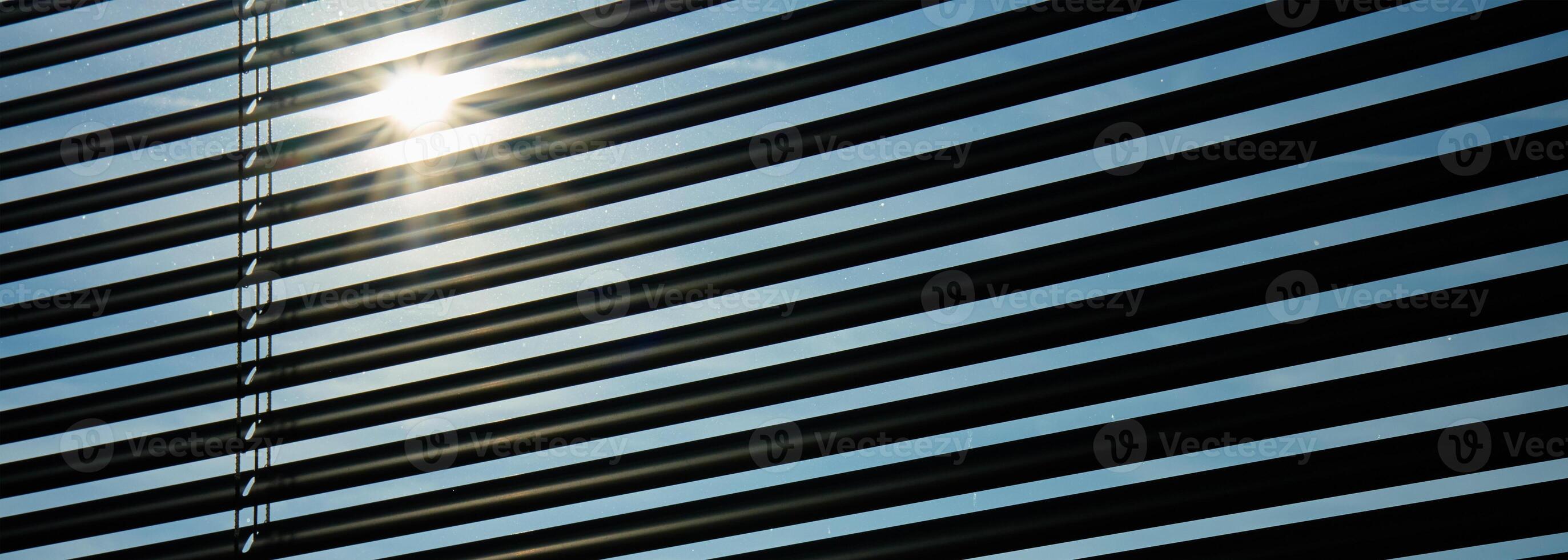 Blinds on the window to protect from sunlight photo