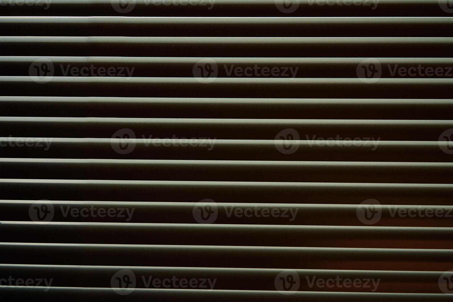 Blinds on the window to protect from sunlight photo