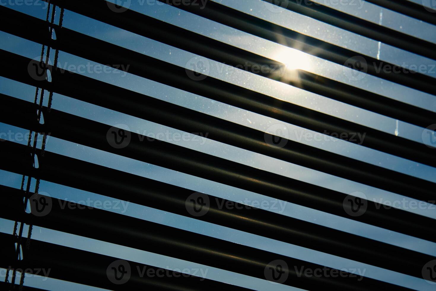 Blinds on the window to protect from sunlight photo