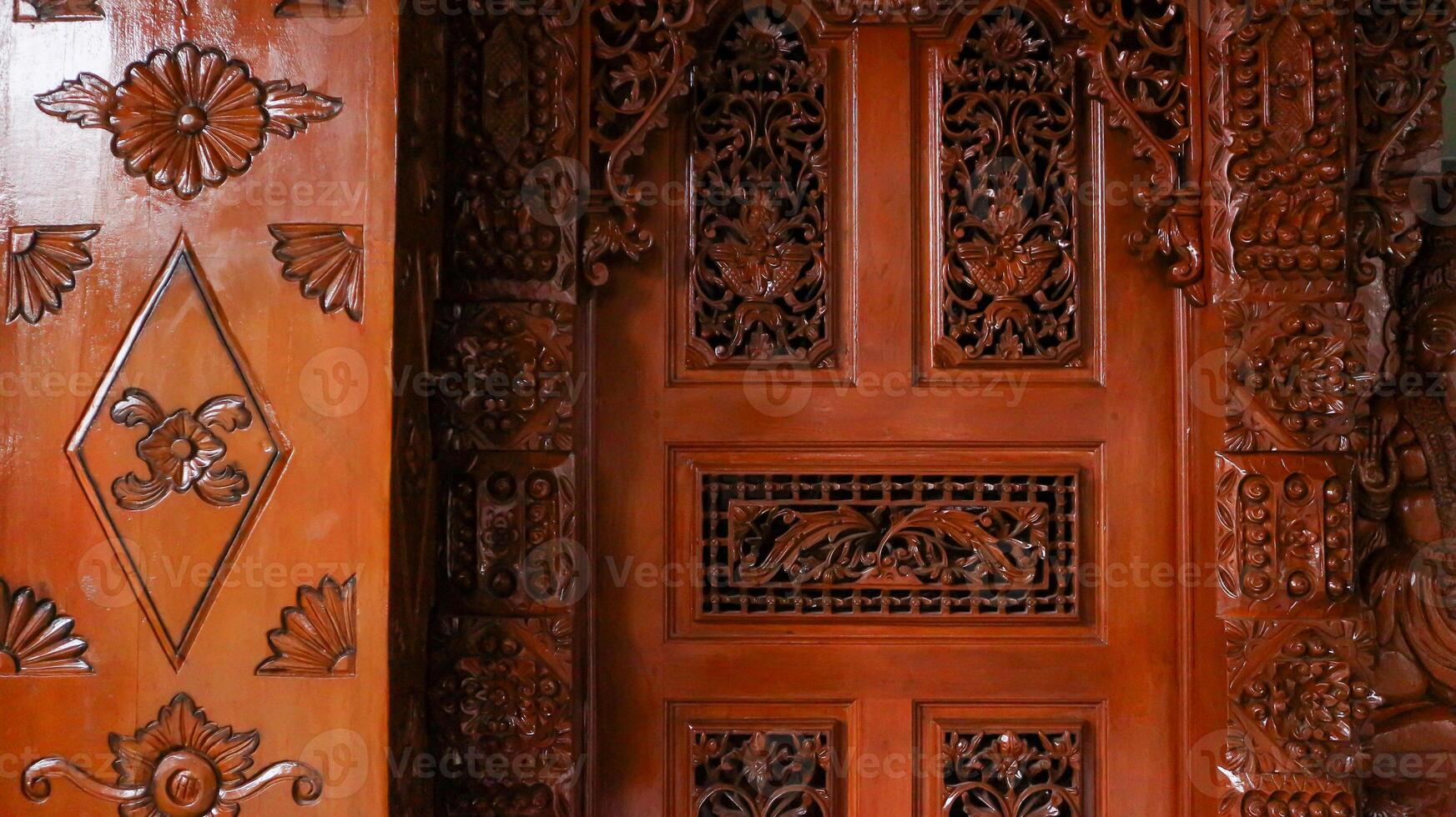 traditional Jepara carving ornaments on the wood photo