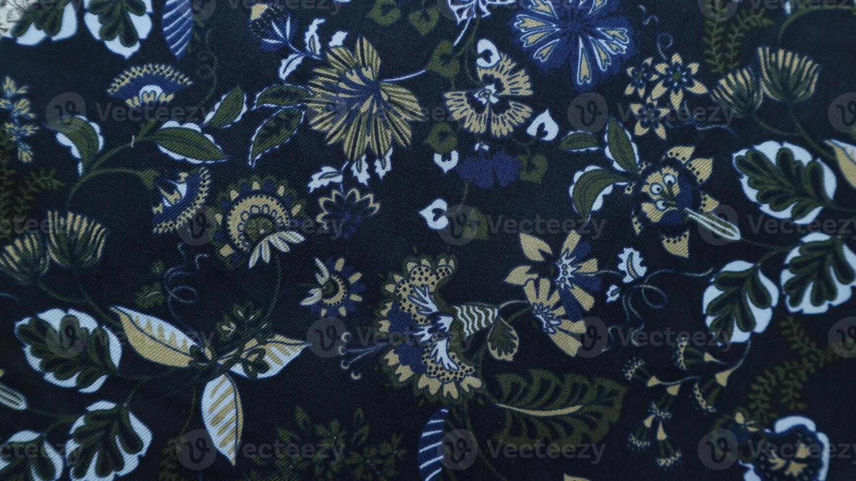 Fragment of colorful retro tapestry textile pattern with floral ornament useful as background photo