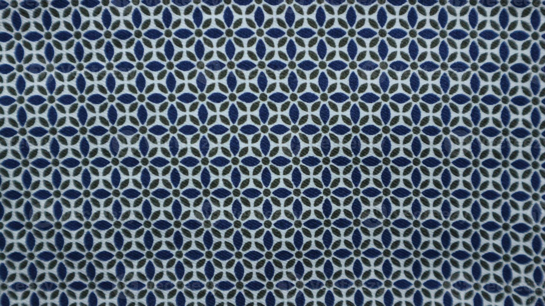 Geometric ethnic pattern made with straw in black and white. knitting fabric pattern for background photo