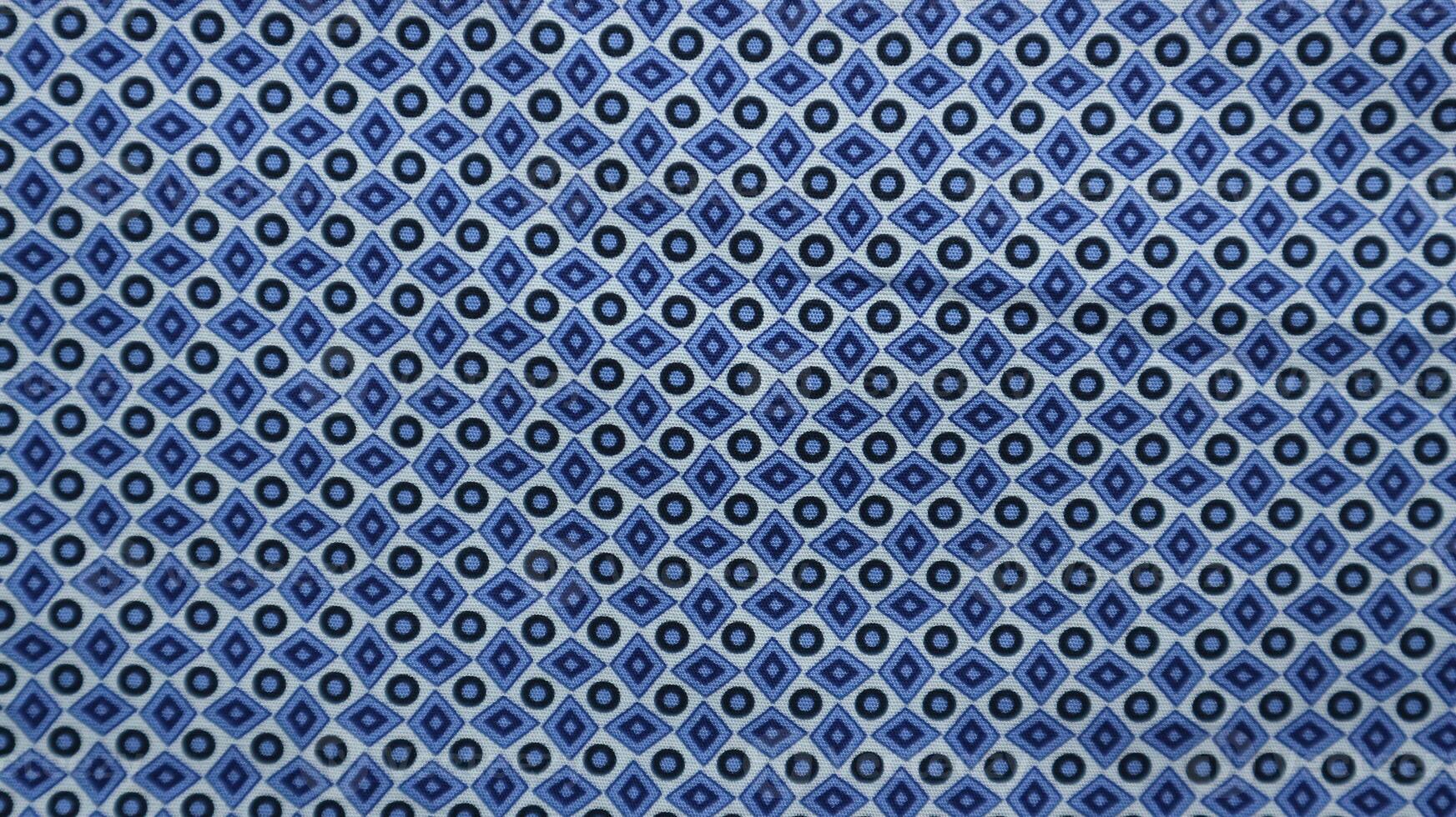 Geometric ethnic pattern made with straw in black and white. knitting fabric pattern for background photo