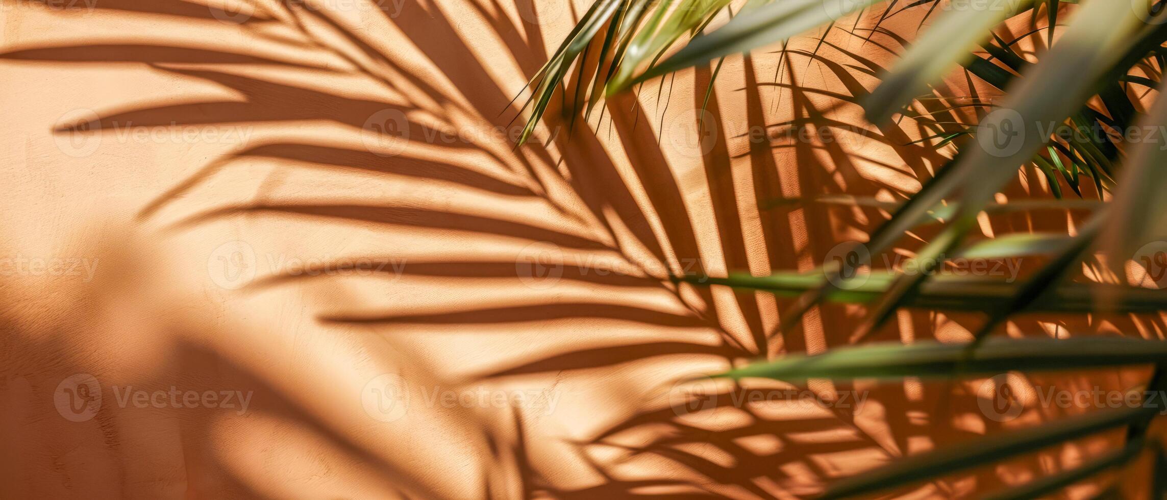 ai generado el interacción de ligero y sombra desde tropical palma hojas crea un artístico modelo en un cálido, texturizado pared foto