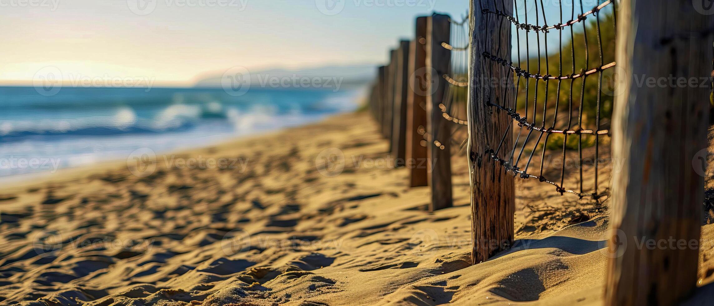 AI generated Beach Fence Shadows on Sandy Shore at Dusk photo