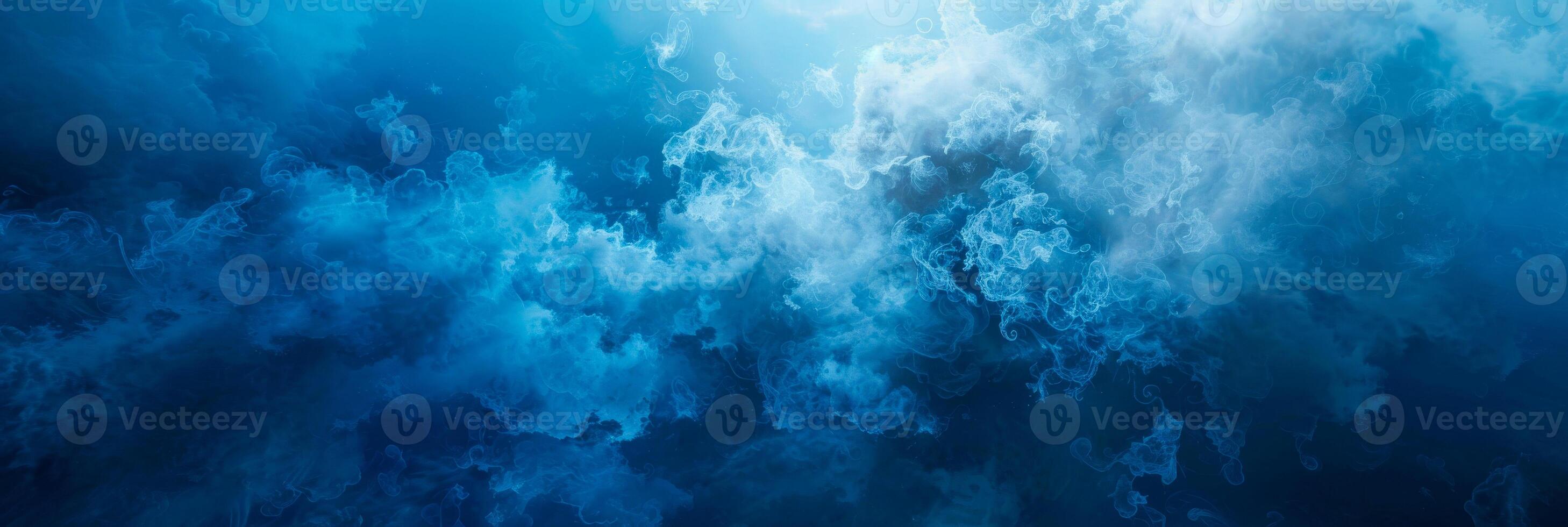 Mystical Blue Smoke Rising in an Abstract Ethereal Pattern photo