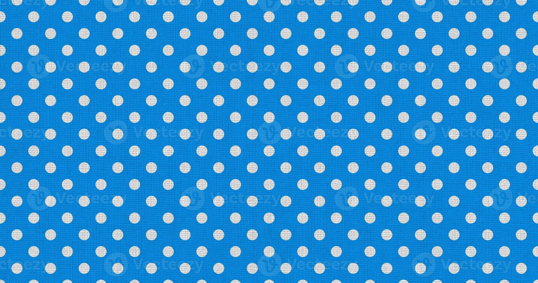 white blue color polka dots fabric photo