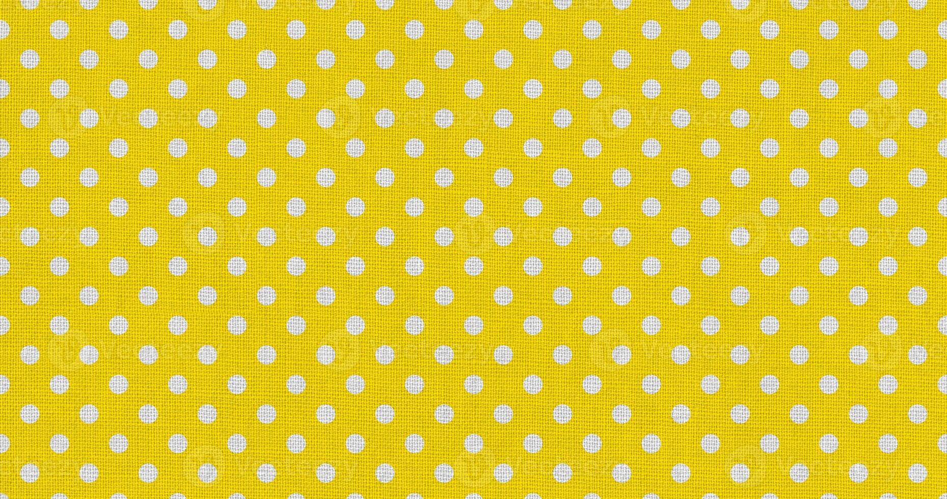white yellow color polka dots fabric photo