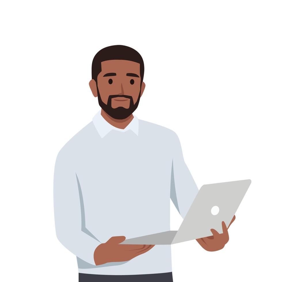 Young black man holding laptop computer and smiling while standing. vector