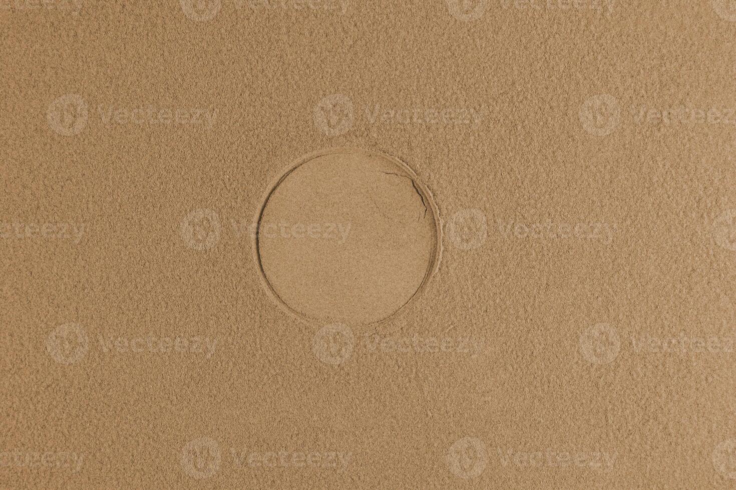 The texture of cosmetic powder is bronze or brown with an imprint in the center of the powder block. Layout for design, blank space for text. photo