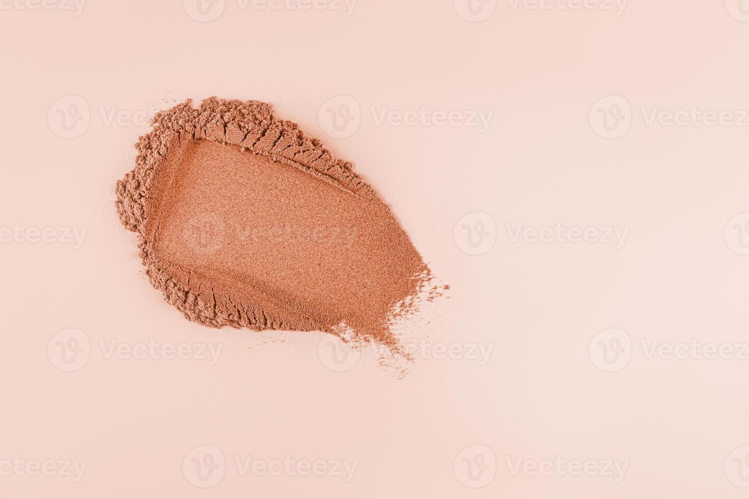 Loose powder swatch for face makeup. bronzer tone. Light and delicate powder structure. Pastel background. A copy space. layout. mockup photo